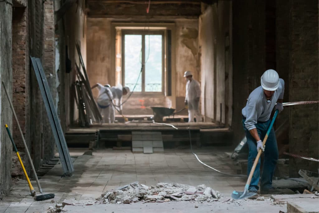 Workmen inside of building for website